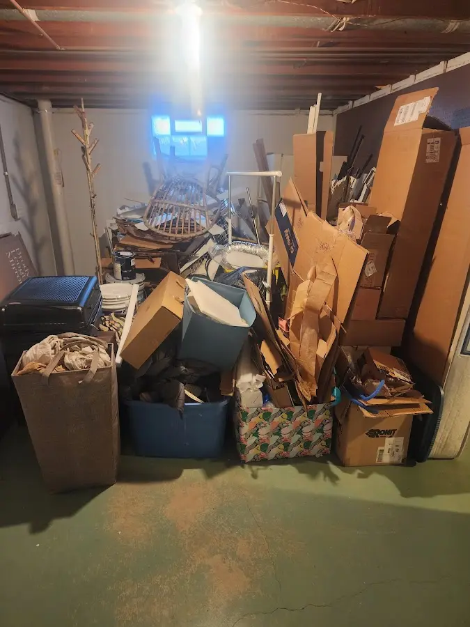 Roll-off dumpster container at job site for Concrete Dumpster Rental in Ashby